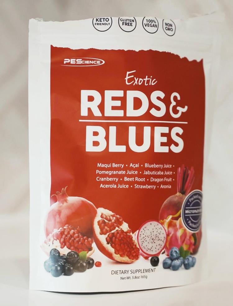 Keto-friendly PE Science supplement featuring exotic red and blue fruits, gluten-free, vegan, and non-dietary.